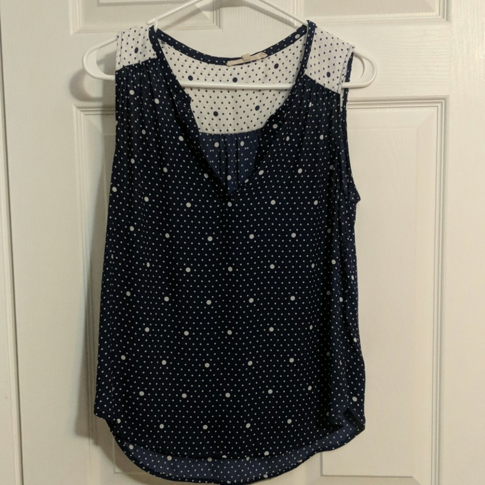 Sleeveless blue and white polkadot top